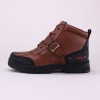 The Boys Tyrek II is an outdoor boot that features a structured leather upper, a reinforced heel and toe, and a sturdy rubber sole.