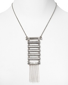 Tap this season's tribal-inspired trend with House of Harlow 1960's totem pole pendant. This linear pendant makes a cool statement with a bold lip and messy top knot.