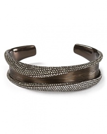 Make a tonal statement with this ridged bangle from Aqua, rimmed in crystals. This piece is perfect to wear stacked with others but it's striking enough to wear solo, too.