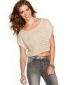 Short roll tab sleeves and a cropped silhouette unite on a top from JJ Basics that's all about shredded heat!