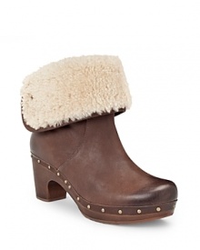 Clog booties are a must-have this season and UGG® Australia does it just right. Cold weather clogs with a shearling fold over cuff and sheepskin lining will keep you cozy all day long. Clog booties are a must-have this season and UGG® Australia does it just right. Cold weather clogs with a shearling fold over cuff and sheepskin lining will keep you cozy all day long.