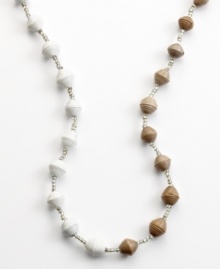 Old news is good news. Heart of Haiti artisans create this one-of-a-kind necklace from recycled newspaper, hand-rolling tiny strips into beads that are then sealed with clear polish and strung together to make a bold statement. Old news is good news. Heart of Haiti artisans create this one-of-a-kind necklace from recycled newspaper, hand-rolling tiny strips into beads that are then sealed with clear polish and strung together to make a bold statement.