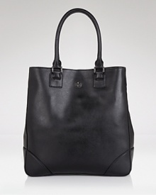 Tall and elegant, this luxe Saffiano leather magazine tote boasts enviable style. Tall and elegant, this luxe Saffiano leather magazine tote boasts enviable style.