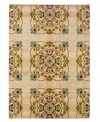 Inspired by classic floral designs of the early Modern age, the Tribecca area rug presents comforting symmetry coupled with divine color. Its streamlined, low-cut pile and durable construction offer a handsome, lasting finish to any room. (Clearance)