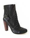 Rebel rebel: prim, laced-up style meets buckled-up moto edge in these Plenty by Tracy Reese booties.