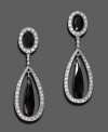 Liven your evening look with these lovely clip-on earrings by Monet. Faceted black glass surrounded by pave crystals set in shining silvertone mixed metal. Approximate drop: 2-1/4 inches.