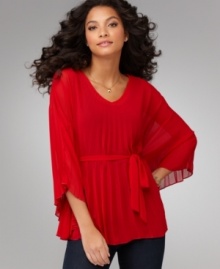 Totally elegant and pleasingly textural, Cha Cha Vente's pleated, belted blouse elevates any outfit!