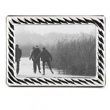 Photo frames by Argento feature unique and authentic tarnish free sterling silver. Hand made and uniquely crafted in Italy. Photo frames by Argento feature unique and authentic tarnish free sterling silver. Hand made and uniquely crafted in Italy.
