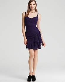 A ruched bodice creates a figure-flattering shape on this hoaglund new york cocktail dress, flaunting a skirt of flirty, feminine ruffles.