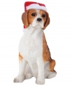 A fetching gift for animal lovers, the beagle Christmas ornament depicts the lovable pup waiting patiently for treats and dressed for the season. From Sandicast.