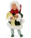 With a pen in-hand and pencil behind his ear, Santa's little helper checks the list to ensure all good boys and girls are accounted for. An adorable figurine with the unmistakable style of Byers' Choice.