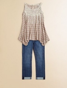 A pretty striped knit gets a little edgy with crochet detail, boho fringe and an asymmetrical hem.Scoopneck with crochet detailSleevelessAsymmetical hem43% rayon/54% polyester/3% spandexHand washMade in the USA A pretty striped knit gets a little edgy with crochet detail, boho fringe and an asymmetrical hem.Scoopneck with crochet detailSleevelessAsymmetical hem43% rayon/54% polyester/3% spandexHand washMade in the USA