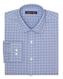This classic fit Michael Kors dress shirt boasts a spread collar and barrel cuffs with a mod blue and navy check print. This classic fit Michael Kors dress shirt boasts a spread collar and barrel cuffs with a mod blue and navy check print.