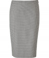 Luxurious pencil skirt in a fine cashmere-wool blend - In an elegant cream with a houndstooth pattern - Particularly nice, high quality material - Typical pencil cut, slim, figure-hugging, in a classic knee length - Wonderfully simple and straightforward, that is why it is so luxurious - No waistband, side  zip - A figure knockout, one that magically makes a dreamy silhouette - An indispensable everyday basic for business women who want to look professional, mature, feminine - Wear with an elegant blouse, tunic (evening), denim jacket (modern), blazer or long cardigan