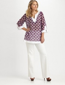 From its spectacular print to its exquisite beading this top embodies the perfect union of luxury and comfort.Stunning beaded necklineThree-quarter sleevesSplit cuffsFrench bust dartsSide slitsPull-on styleAbout 30 from shoulder to hem70% cotton/30% silkDry cleanImported of Italian fabric From its spectacular print to its exquisite beading this top embodies the perfect union of luxury and comfort.Stunning beaded necklineThree-quarter sleevesSplit cuffsFrench bust dartsSide slitsPull-on styleAbout 30 from shoulder to hem70% cotton/30% silkDry cleanImported of Italian fabric