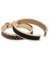 GUESS heeds the call of the wild with this hinge bracelet set. Crafted from gold-tone mixed metal, the set features a snakeskin motif. Approximate diameter: 2-1/4 inches.