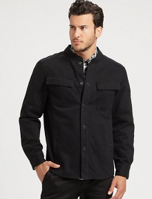 Featuring a classic button-down shirt silhouette, this stand-collar cotton jacket offers laid-back style.Stand collarSnap frontFront pocketsStylish back yokeAbout 28 from shoulder to hemCottonMachine washImported of domestic fabric