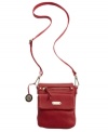 With a padded interior pocket that's the perfect size for an iPad, this contrast-trimmed small flap messenger bag is a smart mix of function and fashion.