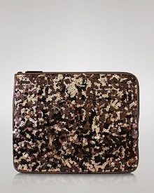 Your iPad flaunts this season's glamour trend with a sequin-suited sleeve from Lodis Accessories--a shimmering little number for your choice gadget. Your iPad flaunts this season's glamour trend with a sequin-suited sleeve from Lodis Accessories--a shimmering little number for your choice gadget.