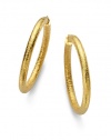 THE LOOKTextured hoop design18k electroplated goldClasp backTHE MEASUREMENTDiameter, about 2ORIGINMade in Italy