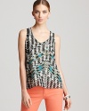 In a graphic tribal print and relaxed fit, this Aqua tank goes from daytime adventures to evening outings in seamless style.