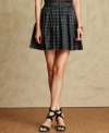 Tommy Hilfiger's plaid-print skirt is made of crisp silk for a luxe look this season and beyond!