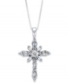 A sparkling symbol of faith. This beautiful cross pendant features round and baguette-cut diamonds (1/2 ct. t.w.) in 14k white gold. Approximate length: 18 inches. Approximate drop: 1-1/16 inches.