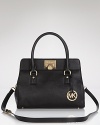 Carry effortless glamor with this leather day bag from MICHAEL Michael Kors. Crafted of rich leather this satchel flaunts versatile style and a perfectly proportioned design.