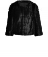 Tap into one of the seasons hottest tactile trends in animal-friendly style with DKNYs black faux fur jacket  - Shorter, slightly boxier cut - Open style, with long sleeves and round neck - Polished and ultra-chic, perfect for parties and evenings out - Pair with a cocktail dress and pumps, or with leather pants and ankle booties