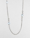 From the Infinity Collection. A long delicate sterling silver strand is accented with blue topaz stones.Blue topaz Sterling silver Length, about 46 Toggle clasp Imported