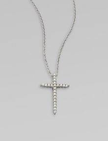 A beautiful cross that sparkles with diamonds in 18k gold on a chain link necklace. Diamonds, .1 tcw18k white goldLength, about 16 to 18 adjustablePendant size, about ½ Lobster clasp closureMade in Italy A beautiful cross that sparkles with diamonds in 18k gold on a chain link necklace. Diamonds, .1 tcw18k white goldLength, about 16 to 18 adjustablePendant size, about ½ Lobster clasp closureMade in Italy