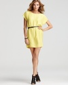 With a knowing nod toward the 80s, the BCBGeneration dress glows in lemon yellow, offset with a chic contrast belt. The relaxed shift silhouette makes it everday easy.