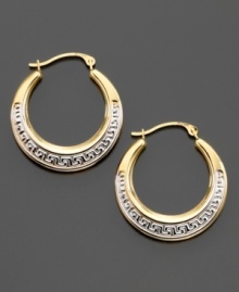 An age-old design symbolizing infinity and unity, the Greek key design looks decadent on these hoop earrings crafted in yellow and white 14k gold. Approximate diameter: 1/2 inch. An age-old design symbolizing infinity and unity, the Greek key design looks decadent on these hoop earrings crafted in yellow and white 14k gold. Approximate diameter: 1/2 inch.
