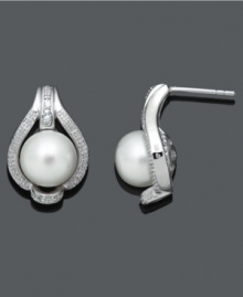 Stunning studs. A simple design in cultured freshwater pearl (9-10 mm) gets an extra sparkling touch with the addition of diamond accents. Crafted in sterling silver. Approximate diameter: 3/4 inch. Stunning studs. A simple design in cultured freshwater pearl (9-10 mm) gets an extra sparkling touch with the addition of diamond accents. Crafted in sterling silver. Approximate diameter: 3/4 inch.