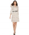 Bring on the texture! Take the spring by storm in this voluminous tiered petite dress from Alfani. Belted to flatter and constructed with everyday comfort in mind.
