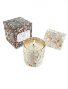 A delicate blend of White Honeysuckle and Baby Jasmine in a decorative mother-of-pearl vessel. An alluring scent and elegant warm glow will turn any room into a seaside retreat. Burn time is approximately 60 hours. A delicate blend of White Honeysuckle and Baby Jasmine in a decorative mother-of-pearl vessel. An alluring scent and elegant warm glow will turn any room into a seaside retreat. Burn time is approximately 60 hours.