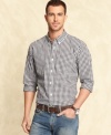 Button up handsome style with this slim fit checkered shirt from Tommy Hilfiger.