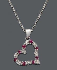 The perfect way to express your love. This open-cut heart pendant by Victoria Townsend features bright red rubies (1/3 ct. t.w.) and sparkling diamond accents set in sterling silver. Approximate length: 18 inches. Approximate drop: 7/8 inch. The perfect way to express your love. This open-cut heart pendant by Victoria Townsend features bright red rubies (1/3 ct. t.w.) and sparkling diamond accents set in sterling silver. Approximate length: 18 inches. Approximate drop: 7/8 inch.