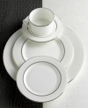 Express the best of taste at the table. Lustrous banded details add a crisp, clean finish to the white china tea cup.