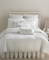 Metallic bands of intricate beading wrap around a crisp white ground, creating an effortless, glimmering accent for your Martha Stewart Collection bedding.