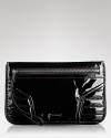 Glossy leather lends high shine and style to a wristlet with an edge. From Burberry.