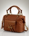 A rich leather satchel crafted in a spacious shape, the Tremont is finished with polished goldtone hardware and a removable shoulder strap for extra convenience.