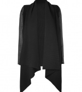 Ultra luxurious and equally cozy, Donna Karans leather sleeve cashmere cardigan is as versatile as it is chic - Shawl collar, leather long sleeves, longer draped front - Fitted sleeves - Wrap around tissue tees and figure-hugging trousers with statement leather belts