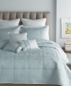 Keep it cool. Lush quilting is the focal point of this revitalizing St. Tropez comforter set from Bryan Keith, showcasing geometric lines in different patterns and directions. This expansive set awakens your room in light shades of refreshing blue.