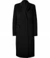 Luxurious coat in fine black wool - A modern classic, buy once, wear forever - Feminine, slim cut, about knee length - Short lapels, flap pockets, breast pocket and hook closure - Ingenious all-around coat, a dream piece that looks elegant and classic on the one hand, modern and feminine on the other - Wear with a business suit to work and for evening wih a cocktail dress