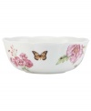 Grow your garden. The Butterfly Meadow Bloom serving bowl from Lenox features the sturdy, scalloped porcelain of original Butterfly Meadow dinnerware but with fresh pink and violet blossoms. Qualifies for Rebate