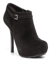 These luxe suede booties feature bold platform toes and sleek stiletto heels for elevated style. By GUESS.