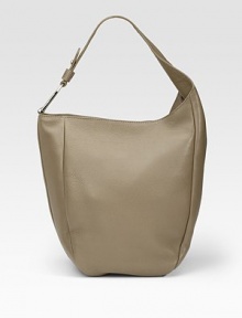 Leather shoulder bag with stirrup detail and light goldtone hardware.Non-adjustable shoulder strap, 8½ drop Top zip closure Inside zip, cell phone & PDA pockets Linen lining 15¾W X 22H X 7¾D Made in Italy Leather shoulder bag with stirrup detail and light goldtone hardware.Non-adjustable shoulder strap, 8½ drop Top zip closure Inside zip, cell phone & PDA pockets Linen lining 15¾W X 22H X 7¾D Made in Italy