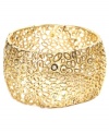 Crazy for cuffs? You're gonna love Jones New York's gemetrically-chic design. Asymmetrical ovals and circles combine with a sporadic dusting of round-cut crystals. Crafted in gold-plated mixed metal with a slip-on hinge clasp. Approximate diameter: 2-1/2 inches.