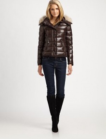 With a hood trimmed with natural coyote fur, this cropped jacket offers effortless glamour and sporty appeal simultaneously . Fur-trimmed hoodConcealed front zipperSnap closurePatch pocketPrincess seamsZipper slash pocketsFully linedAbout 22 from shoulder to hemNylonDry clean by fur specialistImportedFur origin: Canada Model shown is 5'11 (180cm) wearing US size Small. 